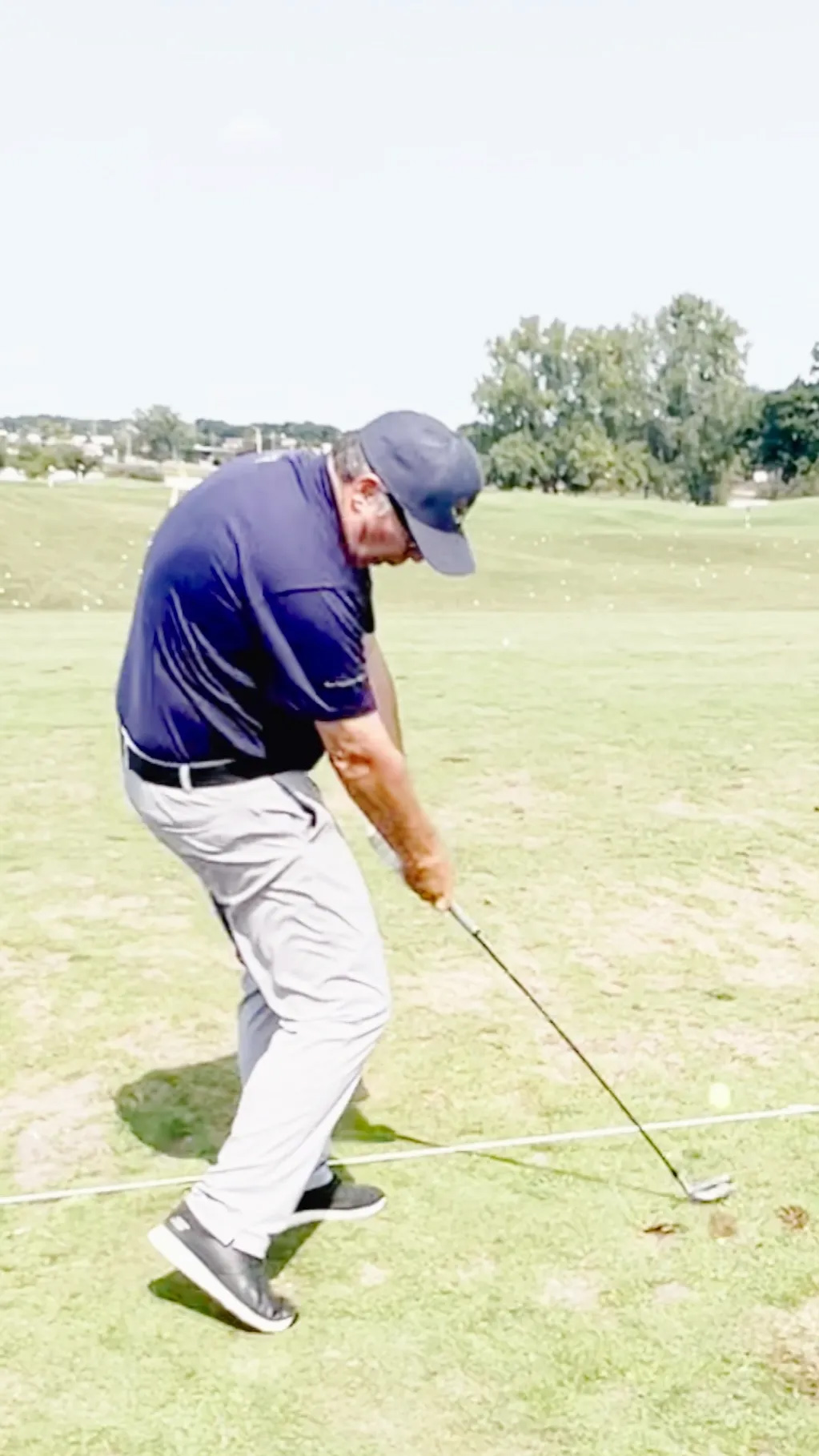 Tim Metko Golf Swing Impact Downview